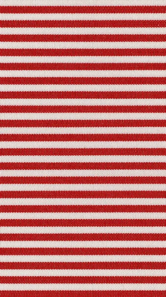 Red striped fabric texture background - vertical — Stock Photo, Image