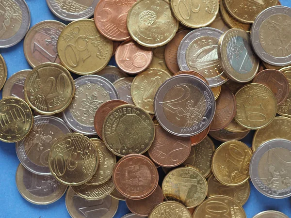 Monety euro, Unia Europejska na niebieski — Zdjęcie stockowe