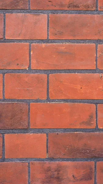 Rode bakstenen muur achtergrond - verticale — Stockfoto