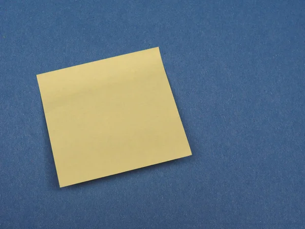 Postit over blue with copy space — Stock Photo, Image