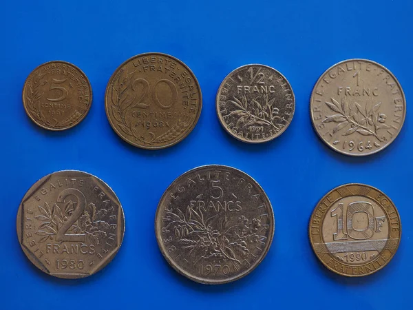 French Franc coins, France over blue — Stock Photo, Image