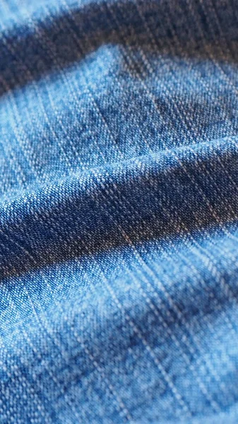 Blue jeans fabric background - vertical — Stock Photo, Image
