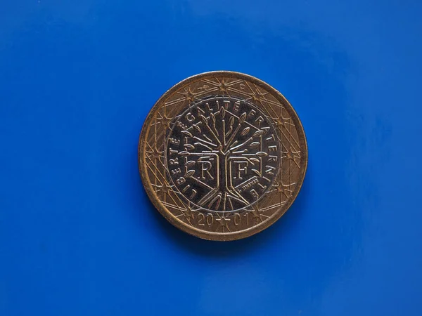 De munt van 1 euro, Europese Unie, Frankrijk over blauw — Stockfoto