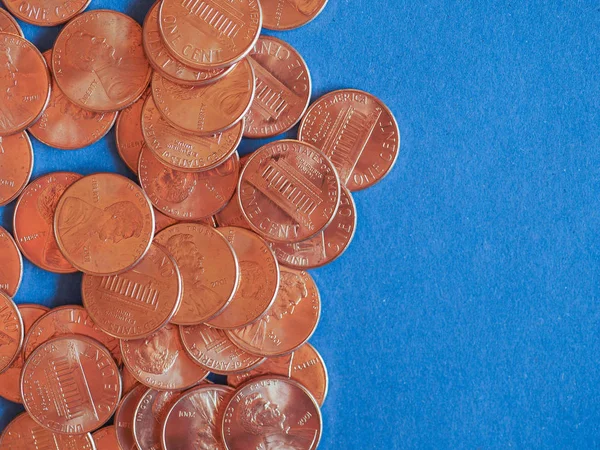 Один цент монетах, Сполучені Штати шпалерами синього кольору — стокове фото