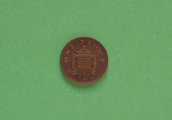 1 moneda de un centavo, Reino Unido sobre verde — Foto de Stock