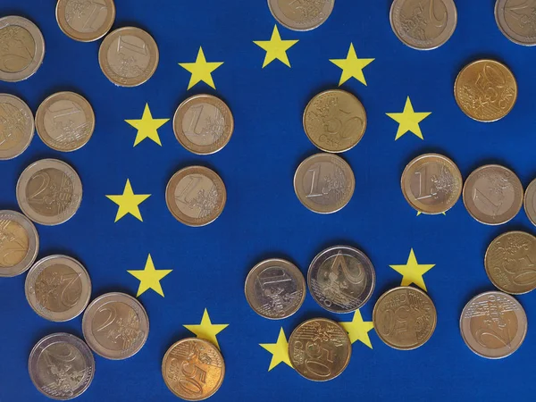 Euro coins, European Union, over flag — Stock Photo, Image
