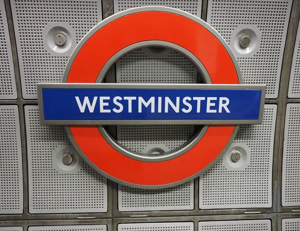 Westminster tube station roundel in london — Stockfoto