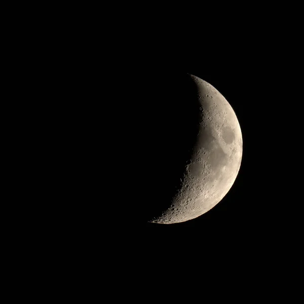 Waxing crescent moon seen with telescope — Stock Photo, Image