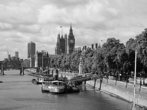 LONDON, UK - CIRCA JUNE 2017: Houses of Parliament aka Westminster Palace seen from River Thames in black and white