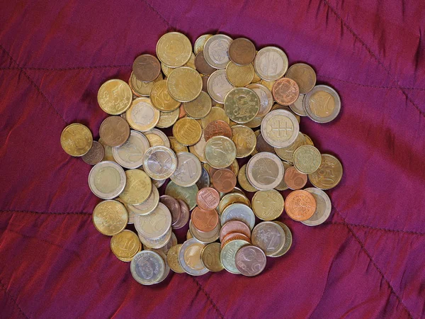 Euro coins, European Union over red velvet background — Stock Photo, Image