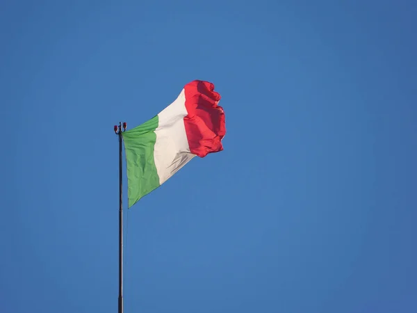 Italian Flag of Italy over blue sky — Stock Photo, Image