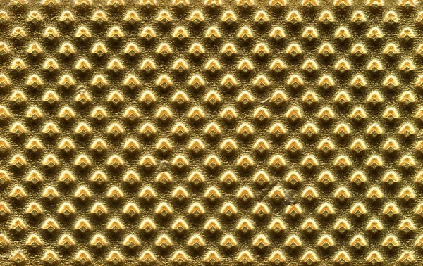 Fondo de textura de metal dorado en relieve — Foto de Stock