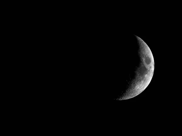 High contrast Waxing crescent moon seen with telescope — Stock Photo, Image