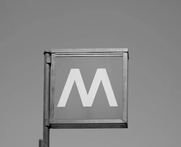 Subway station sign in Milan, black and white — Stock Photo, Image