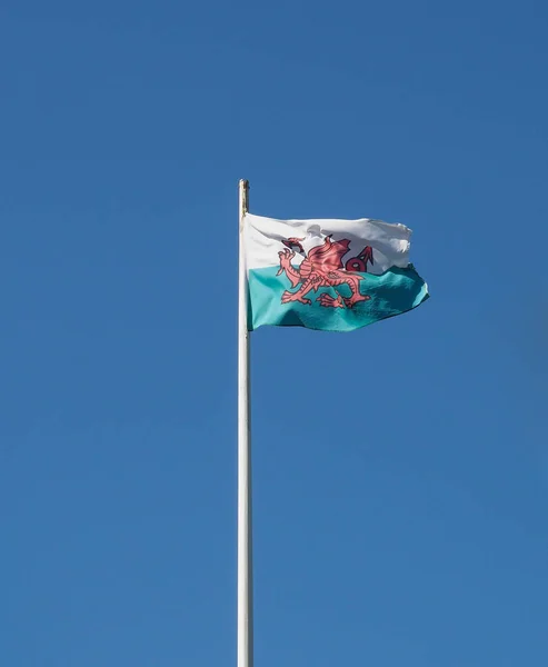Welsh Flag of Wales over blue sky