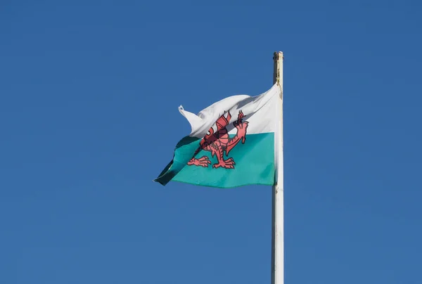Welsh Flag of Wales over blue sky — Stock Photo, Image