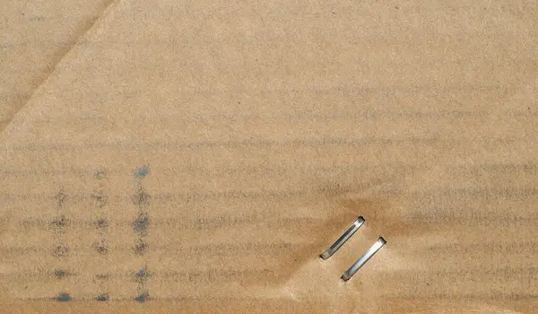 Καφέ κυματοειδές χαρτόνι υφή φόντο — Φωτογραφία Αρχείου