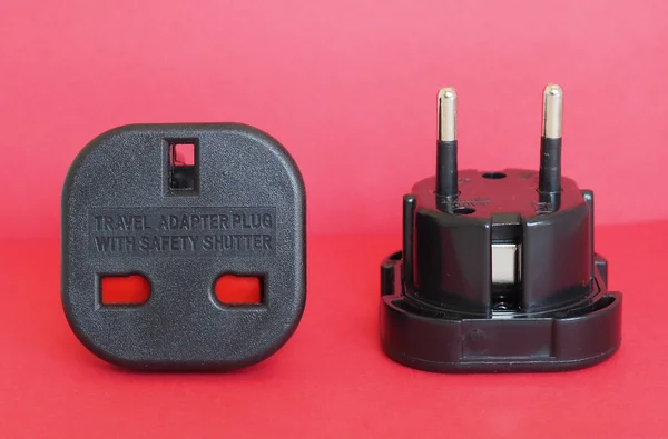 Adaptador de tomada britânico para europeu — Fotografia de Stock