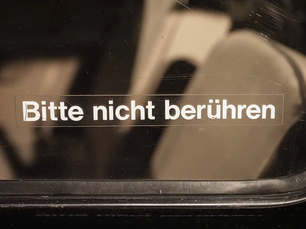 Bitte nicht beruehren (translation: Please do not touch) label — Stock Photo, Image