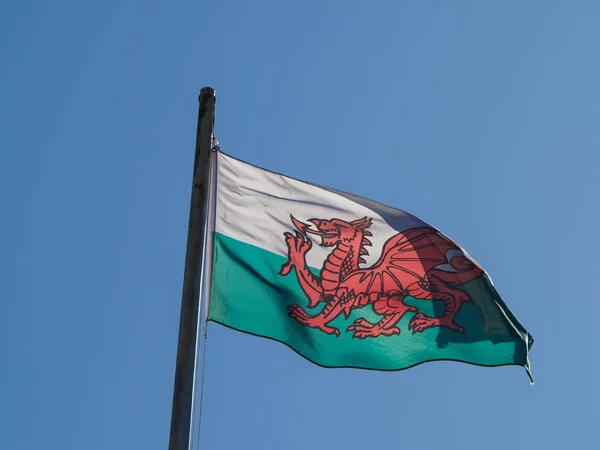 Welsh Flag of Wales over blue sky — Stock Photo, Image