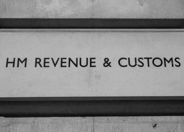 HM Revenue and Customs sign in London, black and white — 스톡 사진