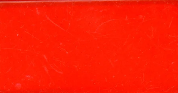 Фон з червоної пластикової текстури — стокове фото