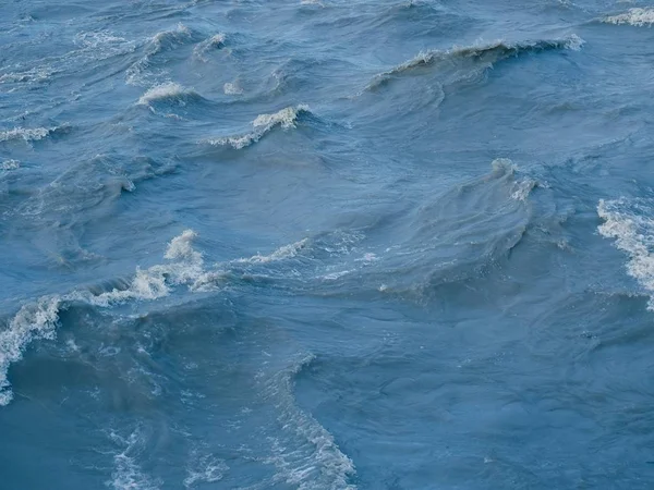 Modré moře vody povrchové pozadí — Stock fotografie