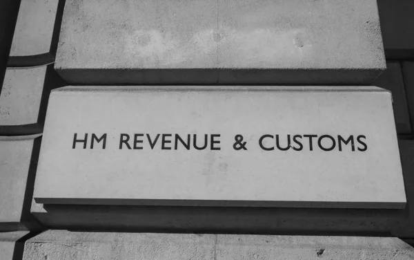 HM Revenue and Customs sign in London, black and white — 스톡 사진