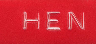 HEN label made with red embossing tape