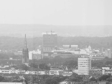 Bettenhaus Unilink and Herz Jesu Kirche church in Koeln, black a