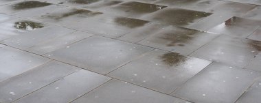 Geniş ıslak kaldırım kopyalama alanı olan kullanışlı bir arkaplan