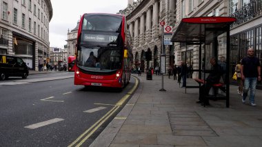 LONDON, UK - CIRCA SEPTEMBER 2019: Regent Street view with double decker bus