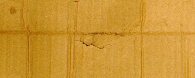 geniş grunge kahverengi kıvrımlı karton dokusu arka plan olarak kullanışlıdır