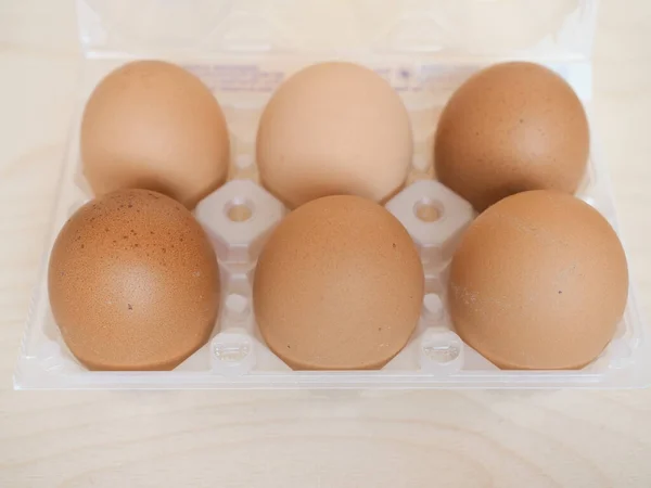 half dozen (six) eggs in carton box