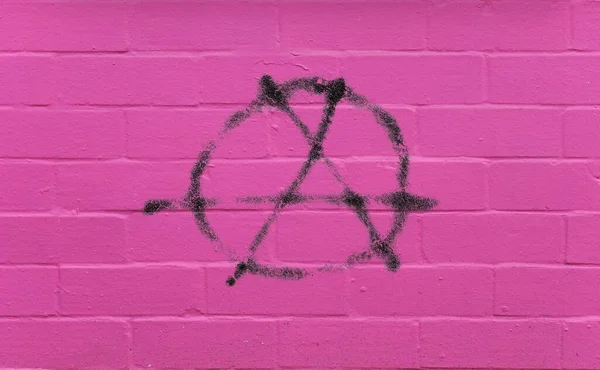 Circle Symbol Anarchy Anarchism Spray Painted Pink Brick Wall — Stock Photo, Image