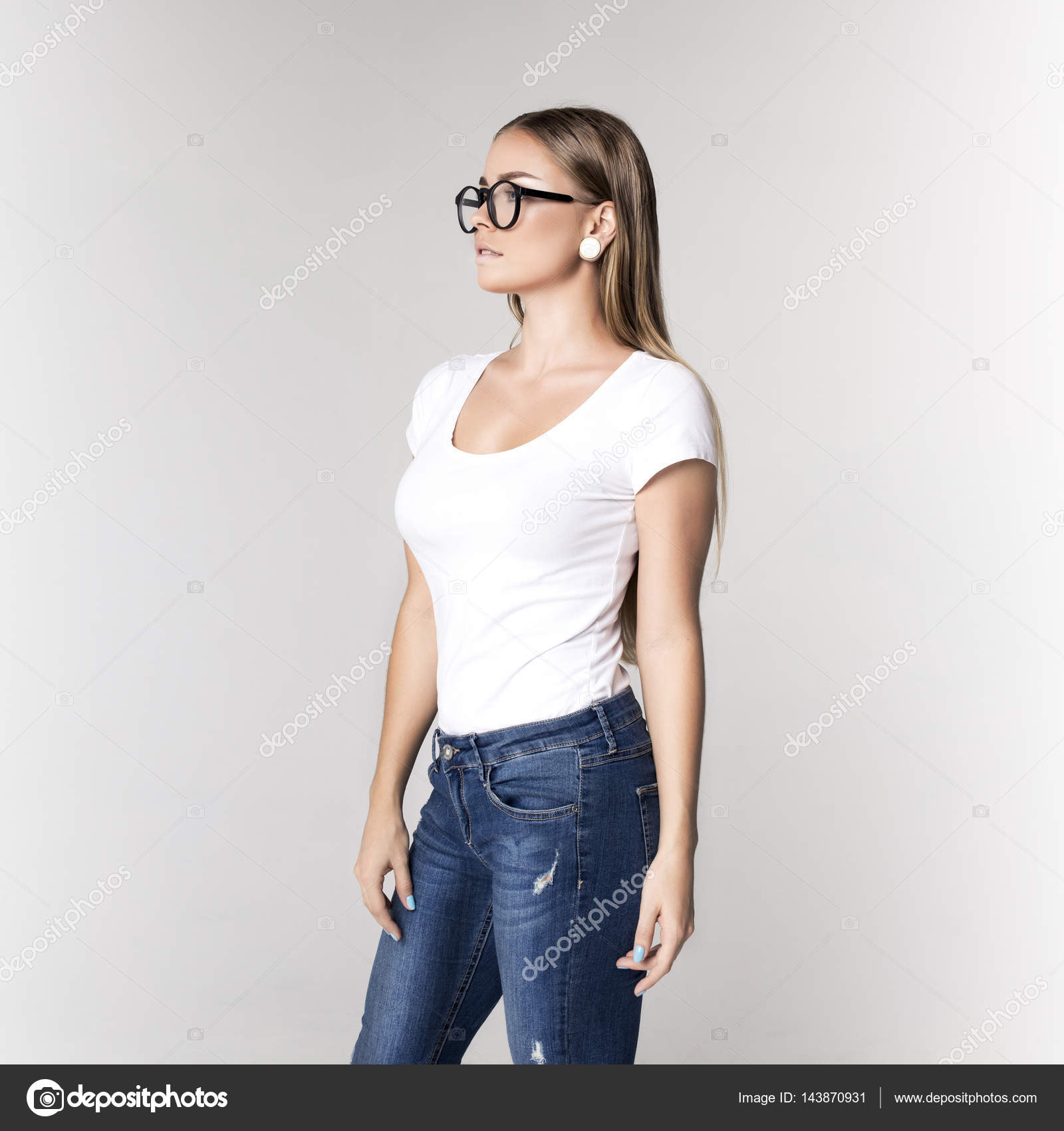Young Woman With Blond Hair In Blue Jeans Woman Without Makeup Fashion Model Emotional Girl Stock Photo By C Karynache