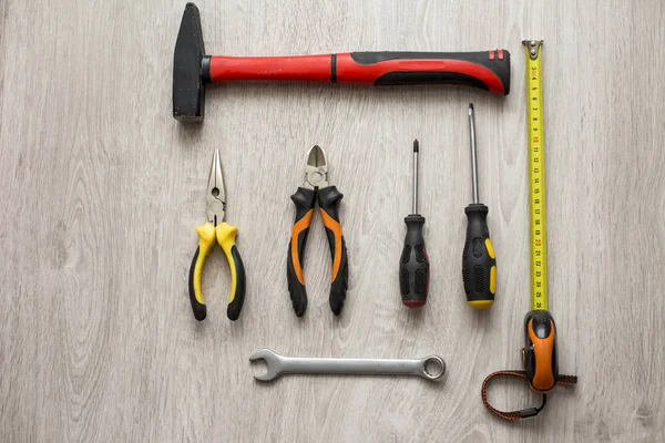 Close up tools on a wooden background — Stock Photo, Image