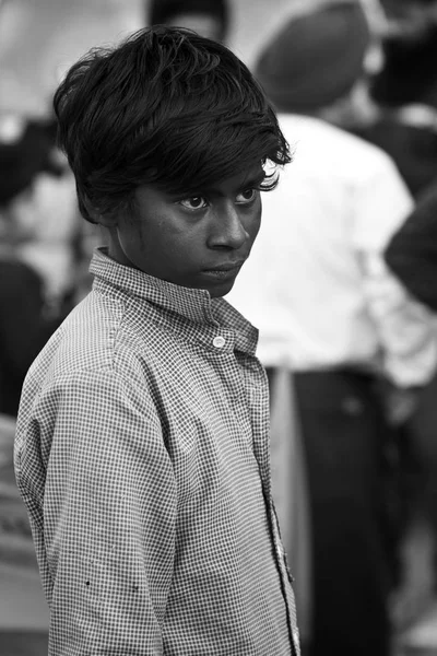 A poor boy looks upon with hope — Stock Photo, Image