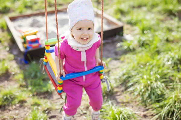 Happy Little Girl Swings Spring Garden Cute Child Looking Camera — Stock Photo, Image