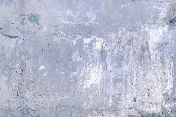 Сіра бетонна стіна з тріщинами і отворами. Тло з текстурою . — стокове фото