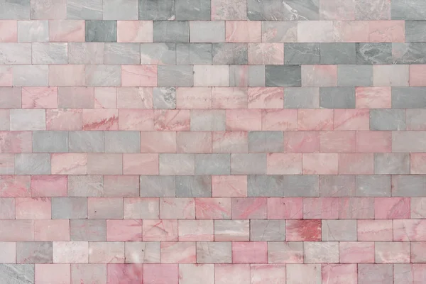 Wall of marble pink tiles. Beautiful stone texture. Empty background — Stock Photo, Image