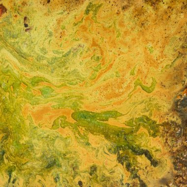 Turuncu ve sarı renkli boşanmalar ile sıradışı bir arka plan. Açıkları ve lekeleri.