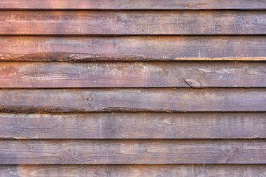 Koyu kahverengi ahşap arka plan. Eski ahşap kaplama dokusu. Siteler ve yerleşimler için fotoğrafçılık