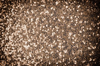 Siteler, planlar ve kartlar için şenlikli, parlak bir arka plan. Koyu altın parıltılar yakın plan