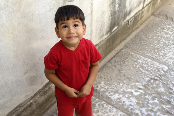 Portrait of smiling boy in the temple of Apollo. — Stock Photo, Image