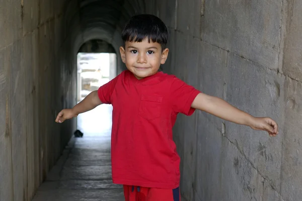 Portrait of smiling boy in the temple of Apollo. — Stockfoto