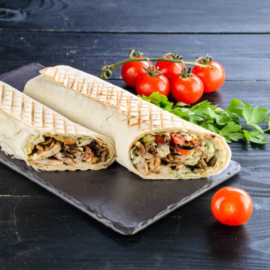 turkish shawarma with chicken and lamb in pita bread clipart