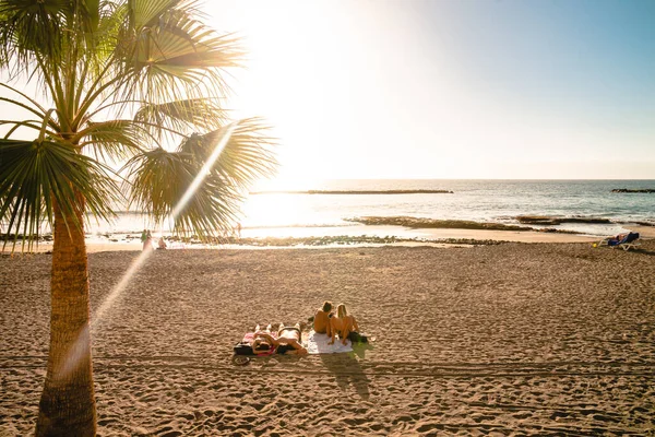 Couple Lies Beach Sunset — Stock Photo, Image