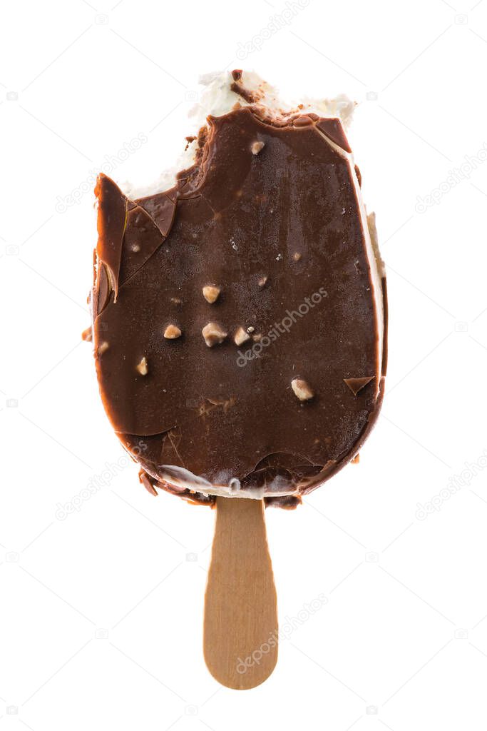 Bitten chocolate vanilla ice cream on stick. Isolated on a white background.