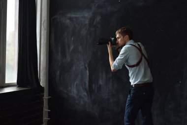 fotoğrafçı ile fotoğraf makinesi 